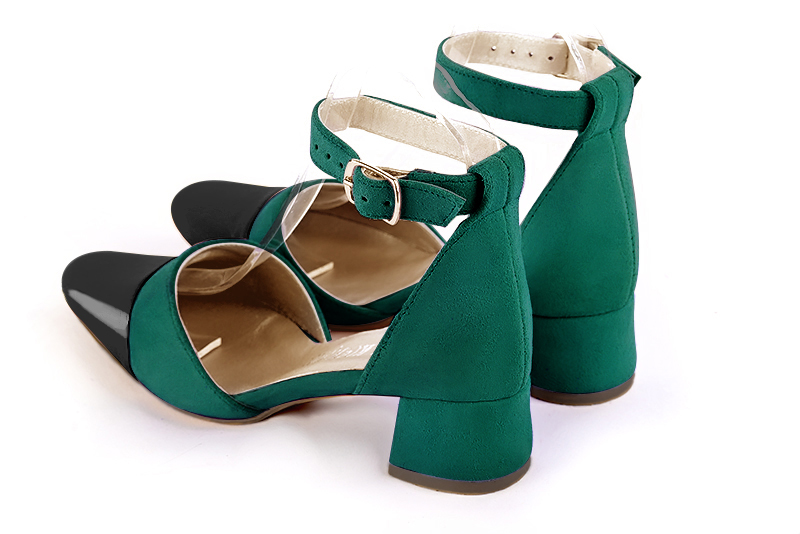 Gloss black and emerald green women's open side shoes, with a strap around the ankle. Round toe. Low flare heels. Rear view - Florence KOOIJMAN